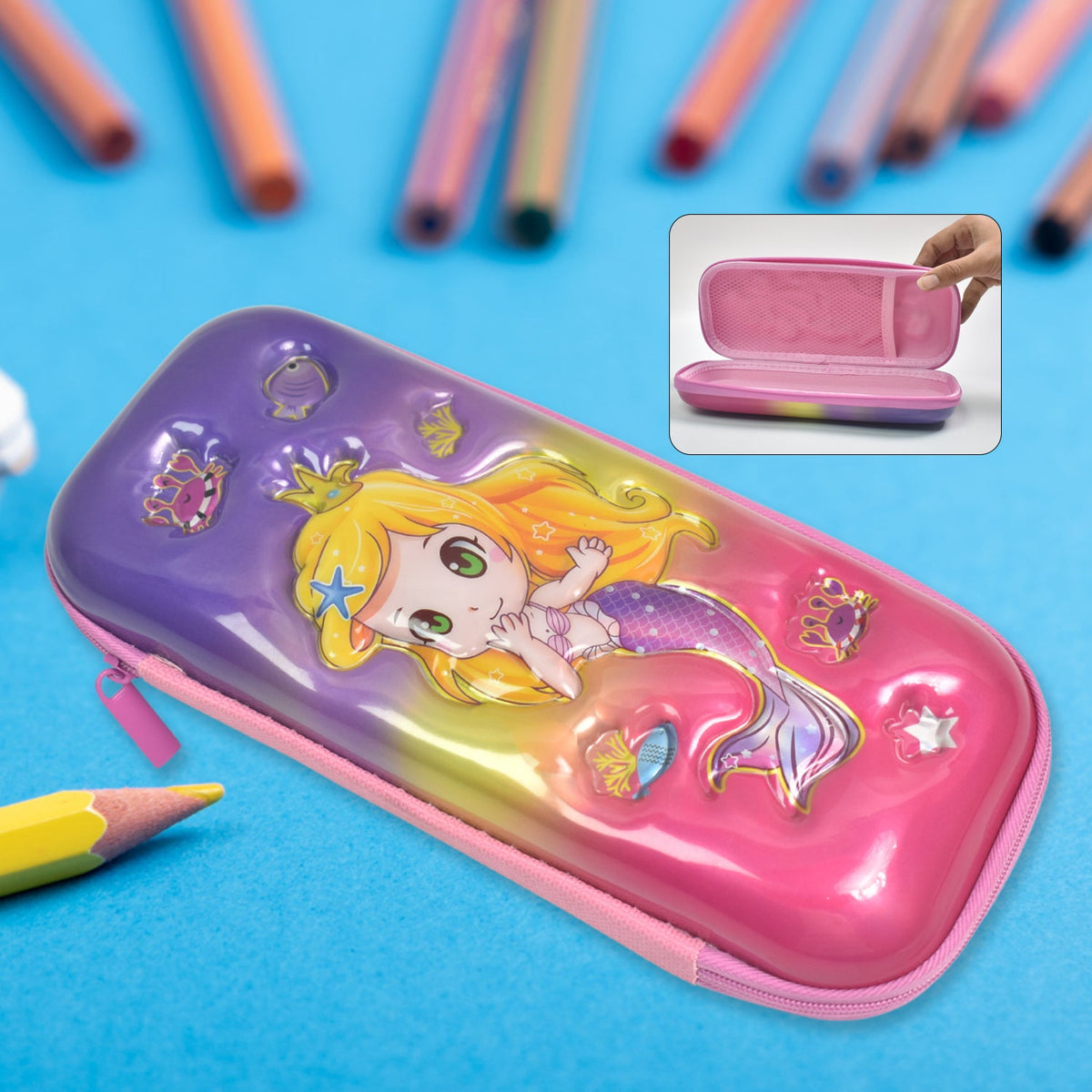 A mermaid pencil case on a blue surface with blurred pencils, featuring an inset showing the open case's interior.