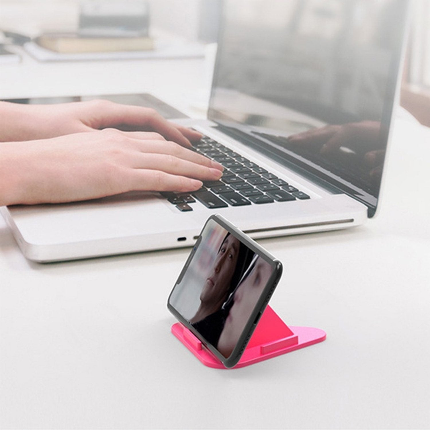 Side view of the Pyramid Mobile Stand holding a smartphone at an inclined angle.