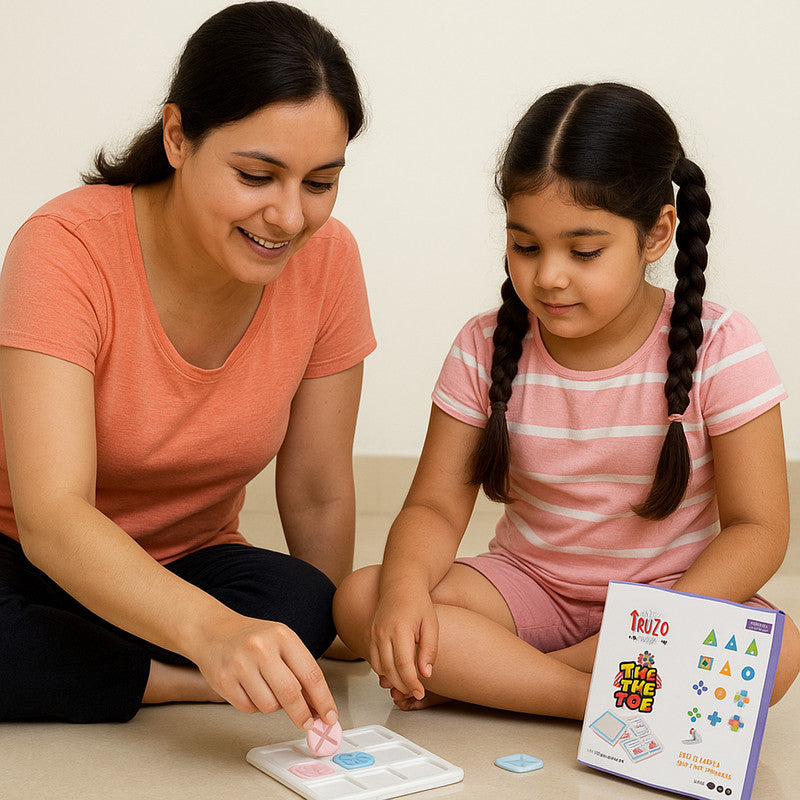 Family enjoying strategy Tic Tac Toe board game