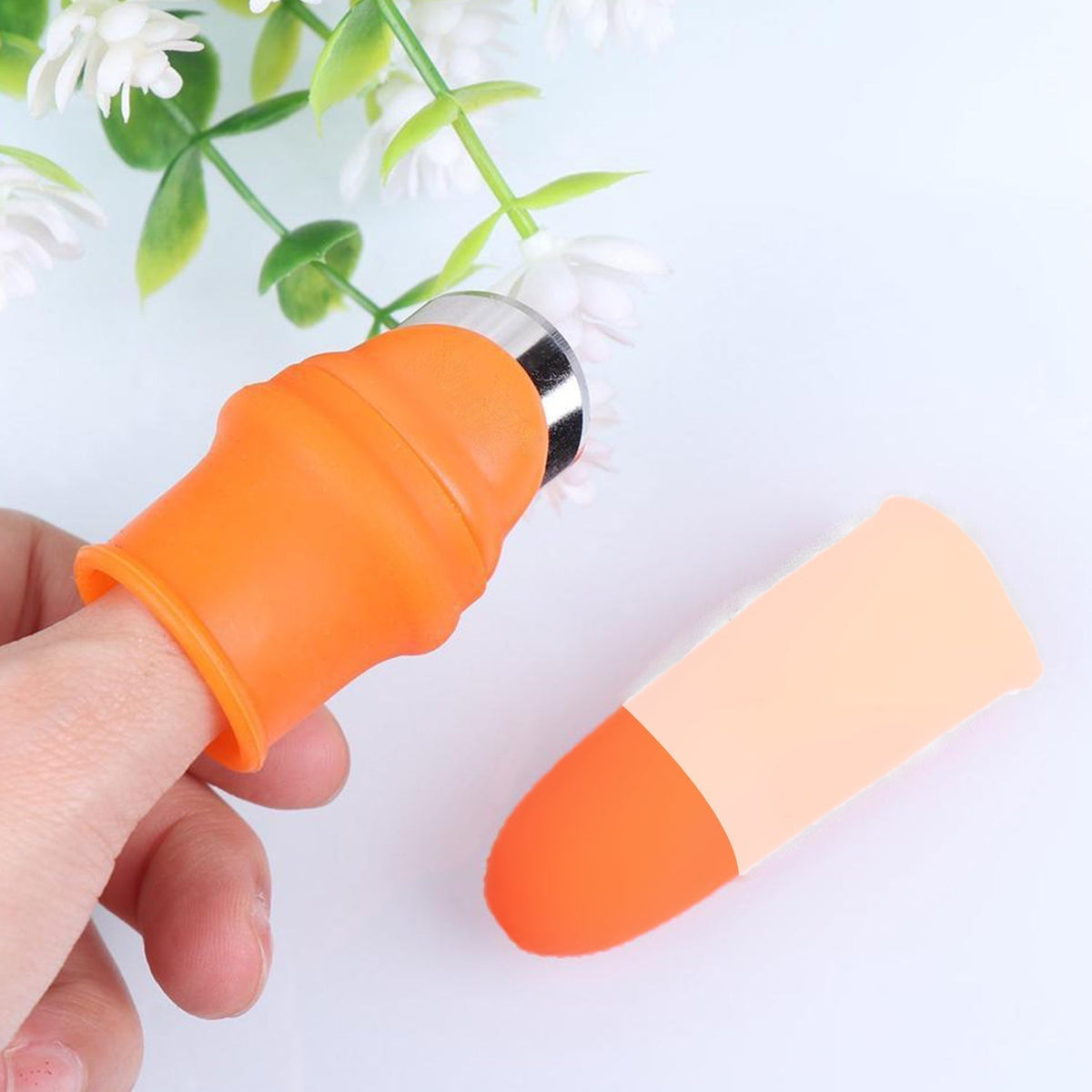 A close-up of the V Thumb Cutter, showcasing its ergonomic design.