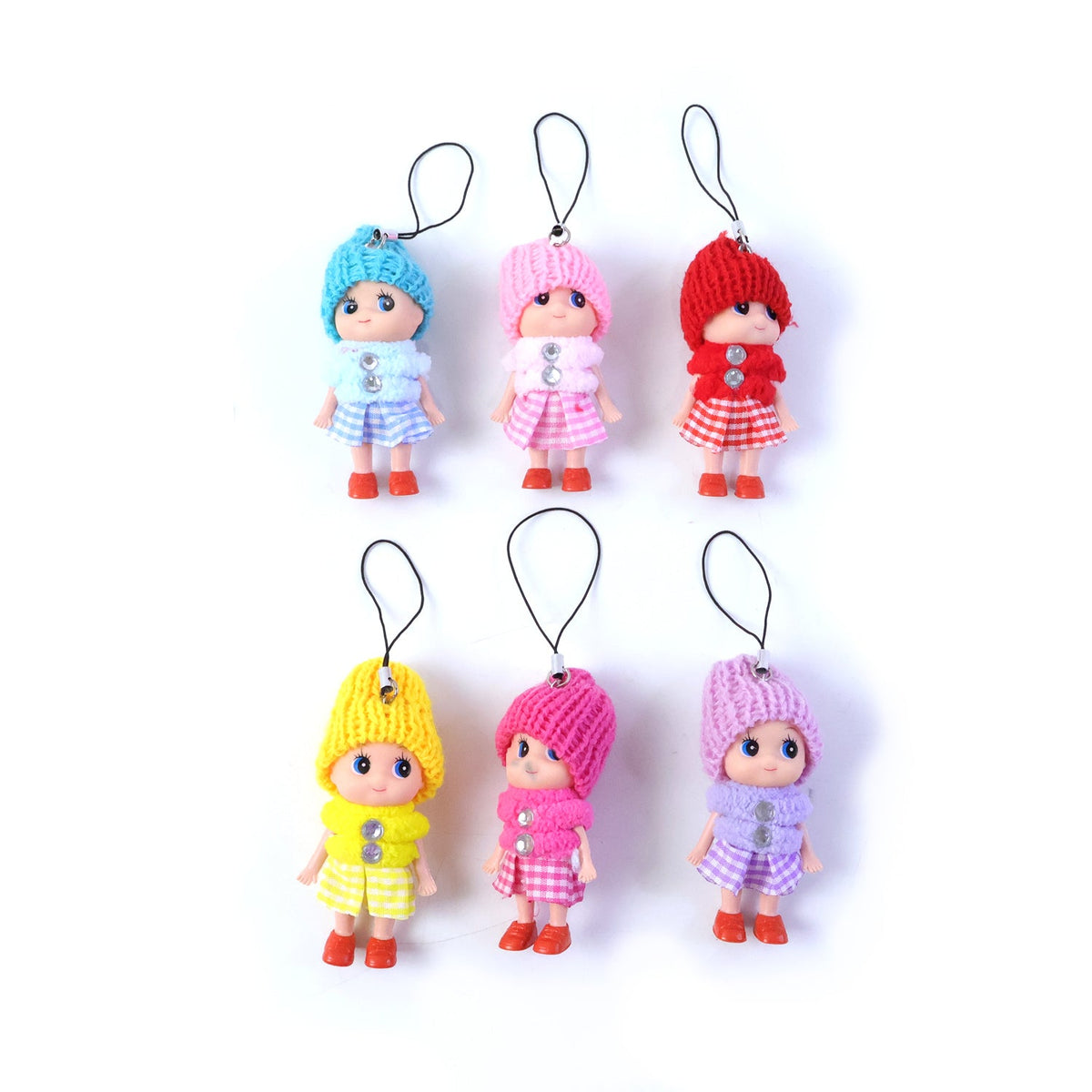 Six colorful doll keychains are neatly arranged in two rows of three on a white background.