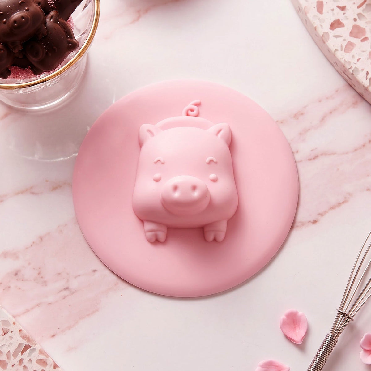 Close-up product view of the cute pig silicone drain cover, highlighting its design.