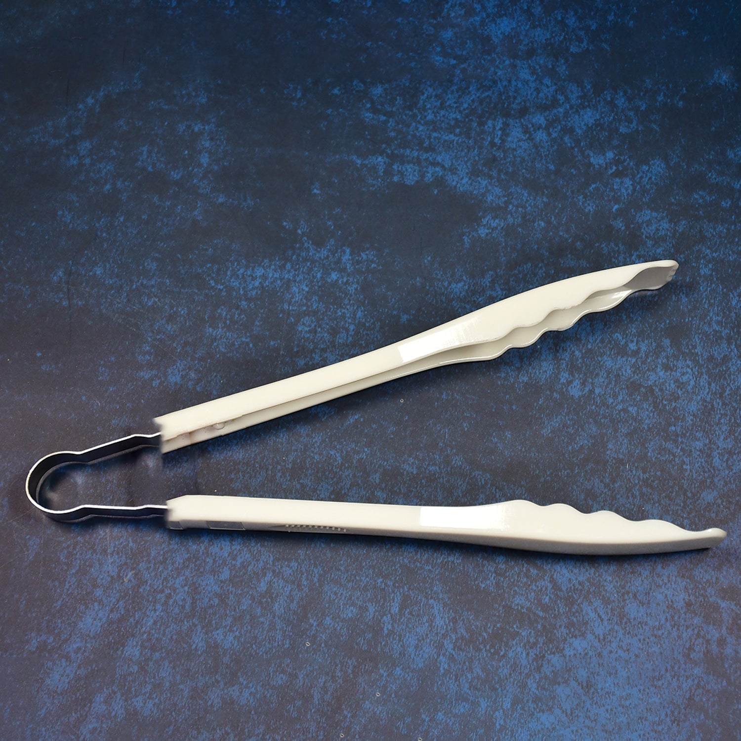 Easy-grip kitchen tongs, perfect for handling food with precision.