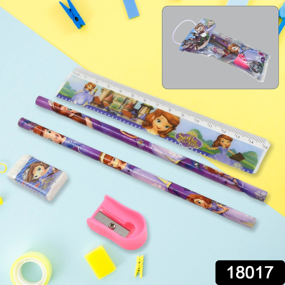 cartoon-themed stationery set including two pencils, a ruler, an eraser, and a pink sharpener on a blue and yellow