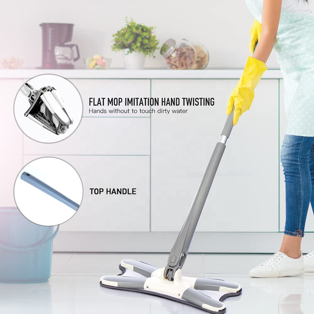 Close-up of the hands-free squeeze mechanism on the X-shape mop with a clean pad.