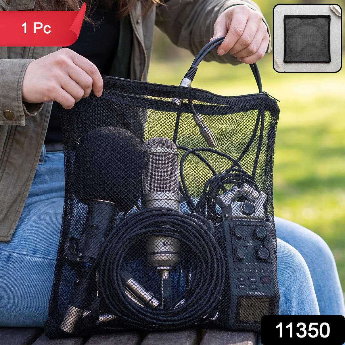 A person holds a black mesh zipper bag filled with microphones and audio cables outdoors, with a red "1 Pc" label.