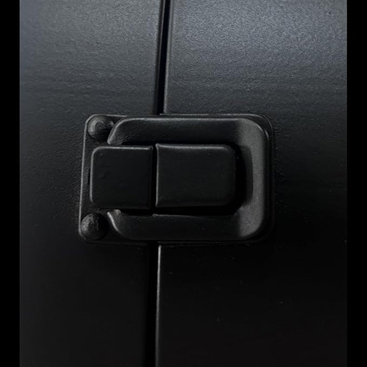 Wall clock mounting latch close-up
