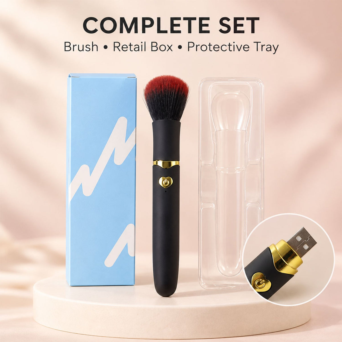 A light blue retail box and a black and red makeup brush in a clear plastic tray are arranged on a light wooden surface.