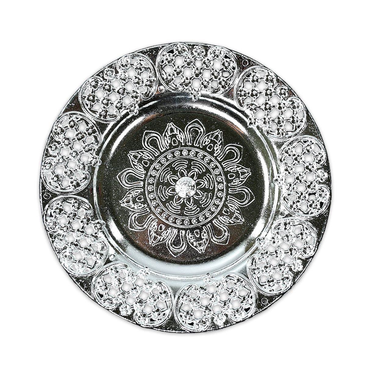 A top-down view of a round, silver-colored plastic pooja thali with intricate embossed patterns and a filigree edge.