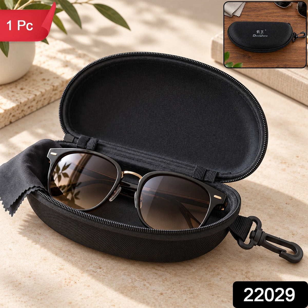 Open black hard shell sunglasses case with black sunglasses and cleaning cloth, with a small inset image of the closed case.