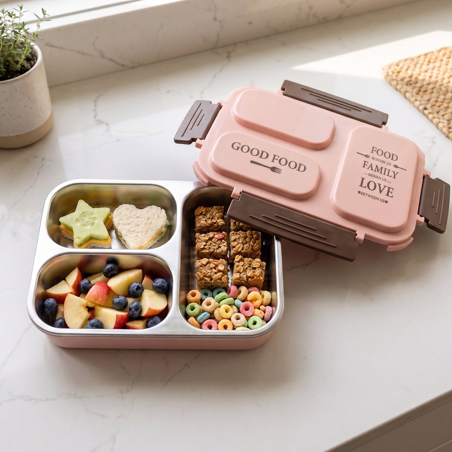 Close-up of stainless steel lunch box compartments for organised meals