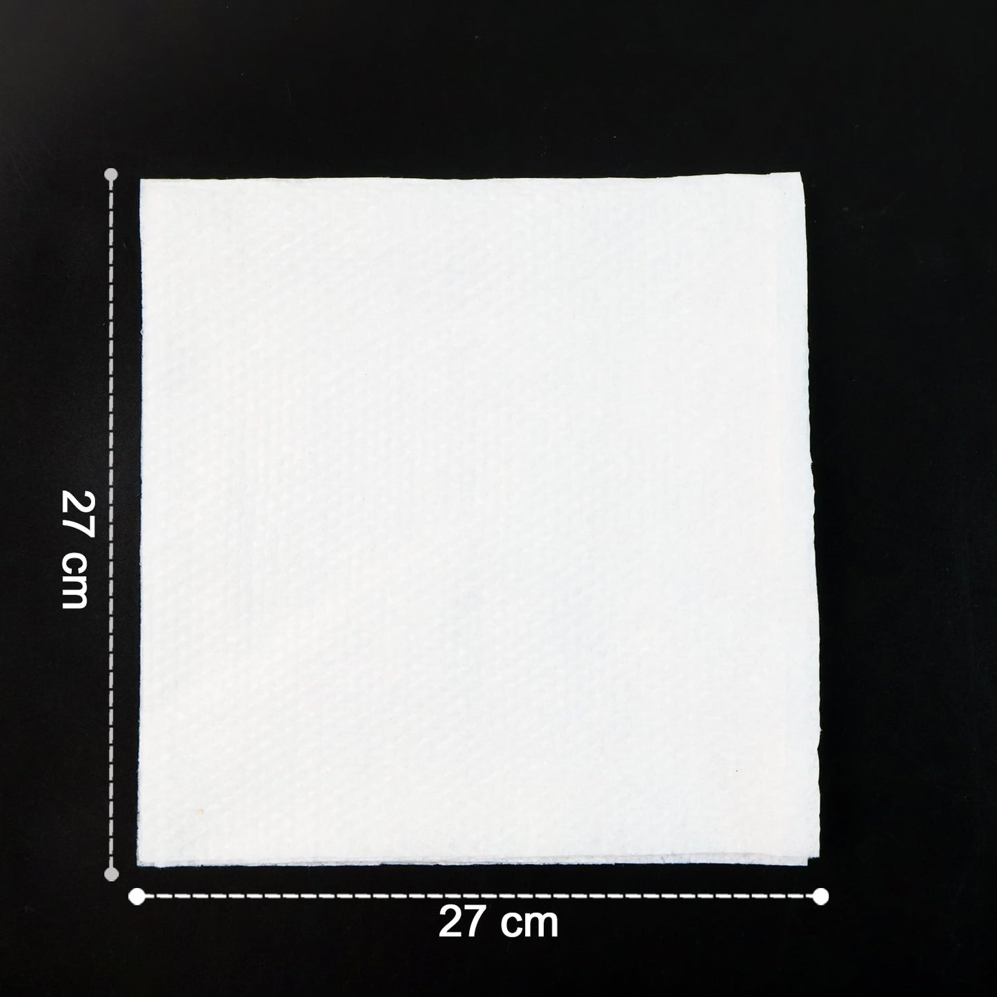 Multicolor tissue paper elegantly folded and used as a disposable table napkin.