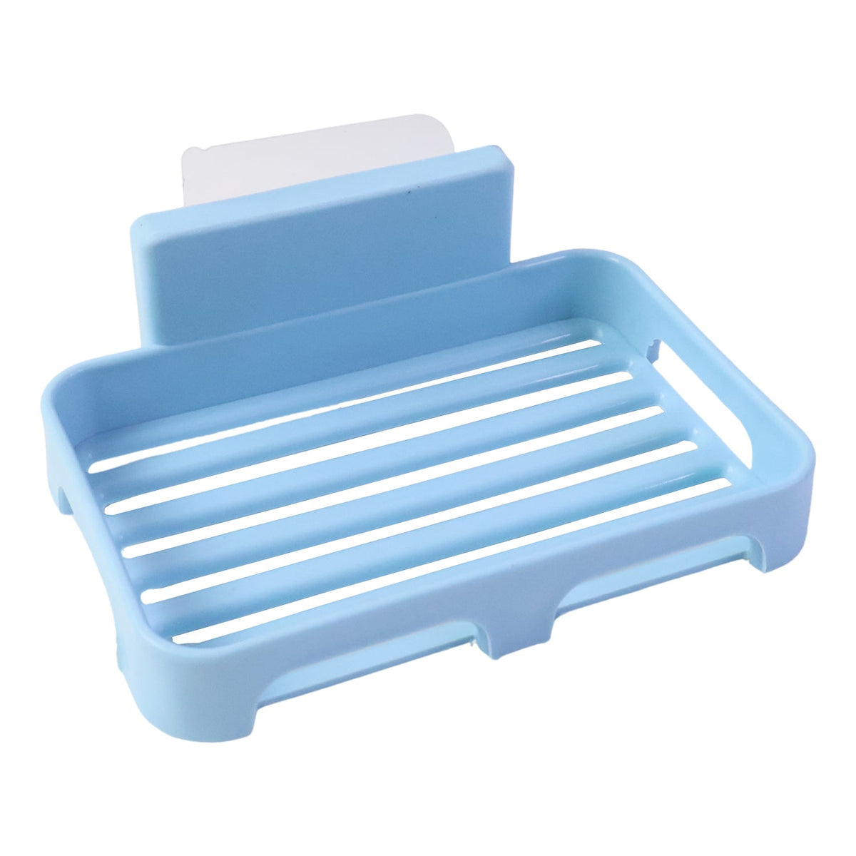 Angled view of a light blue plastic soap dish with drain slots and a clear adhesive backing.