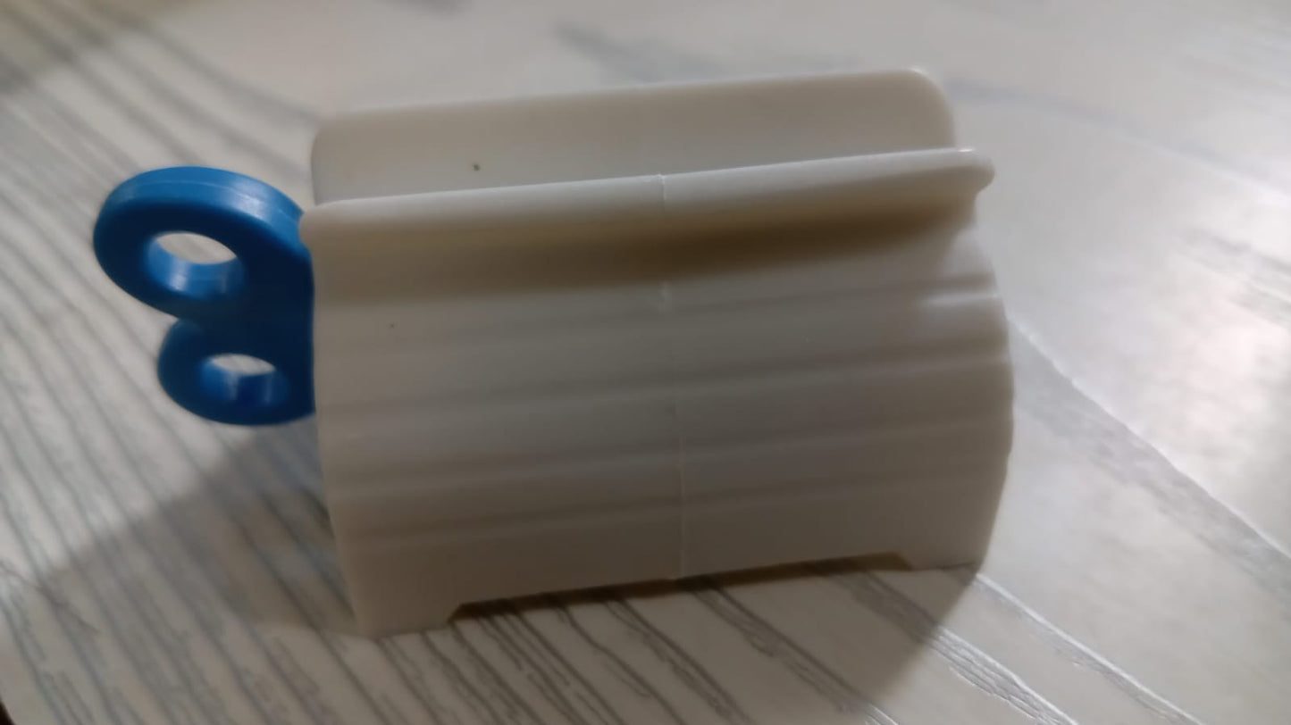 Toothpaste Squeezer – Efficient Tube Roller with Stand | BrushedUp
