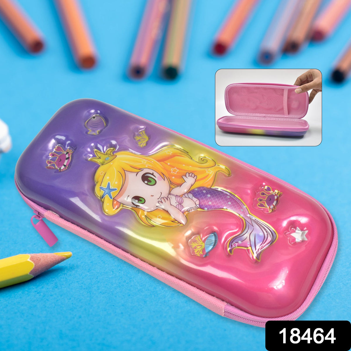 A colorful mermaid pencil case on a blue surface with blurred pencils in the background. An inset shows the open case.